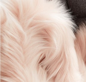 Pouf en fausse fourrure